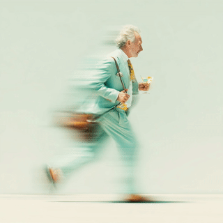 FLIP attonconrad_A_british_man_in_a_pastel_suit_carrying_a_perfect_31e6895e-db01-40ad-bd93-7793a1ac4e57_2